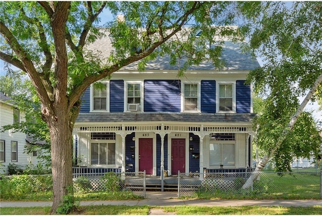 481 Edmund Ave, Saint Paul, MN 55103 - view of front facade featuring a porch, a fenced front yard, and cooling unit