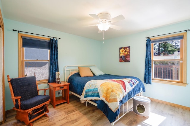 4845 15th Ave S, Minneapolis, MN 55417 - bedroom featuring wood finished floors, baseboards, and a ceiling fan