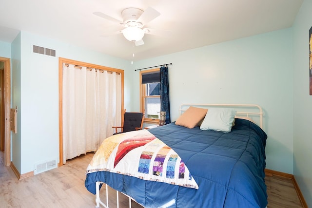 4845 15th Ave S, Minneapolis, MN 55417 - bedroom with wood finished floors, baseboards, and a ceiling fan