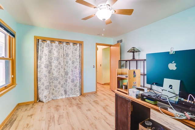4845 15th Ave S, Minneapolis, MN 55417 - home office featuring wood finished floors, baseboards, ceiling fan, and plenty of natural light
