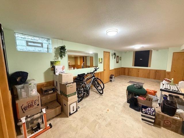 4845 15th Ave S, Minneapolis, MN 55417 - basement with wainscoting, wooden walls, and electric panel