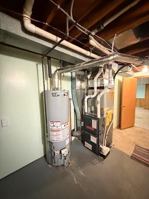 4845 15th Ave S, Minneapolis, MN 55417 - utility room featuring water heater and heating unit