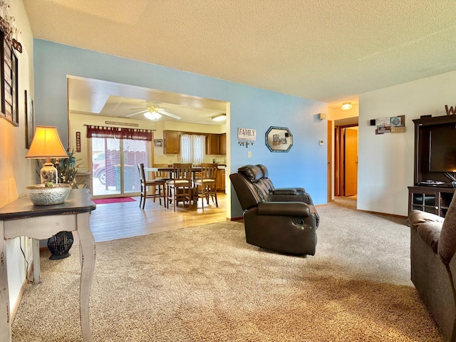1815 Lakewood Ave, Albert Lea, MN 56007 - carpeted living area with ceiling fan and a textured ceiling