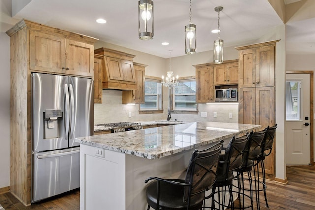 525 Roanoke Ct, Waconia, MN 55387 - kitchen featuring stainless steel appliances, dark wood finished floors, a sink, decorative backsplash, and recessed lighting