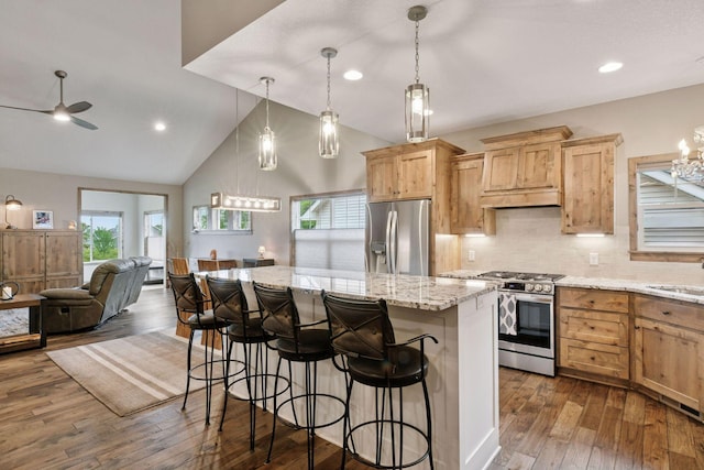 525 Roanoke Ct, Waconia, MN 55387 - kitchen with appliances with stainless steel finishes, ceiling fan, a sink, plenty of natural light, and high vaulted ceiling