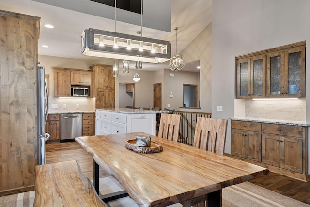 525 Roanoke Ct, Waconia, MN 55387 - dining area featuring wood finished floors and recessed lighting