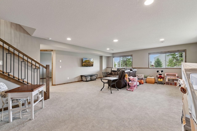 525 Roanoke Ct, Waconia, MN 55387 - living room featuring recessed lighting, light carpet, stairs, and a textured ceiling