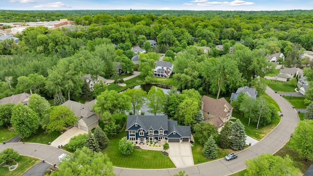 18172 Tamarack Dr, Minnetonka, MN 55345 - aerial view of residential area featuring a heavily wooded area