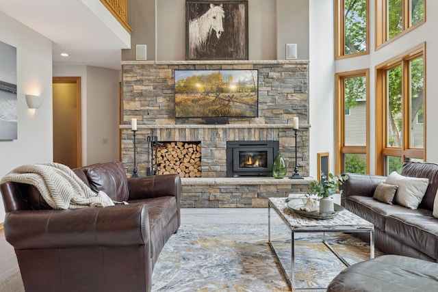18172 Tamarack Dr, Minnetonka, MN 55345 - living room featuring a stone fireplace and a towering ceiling
