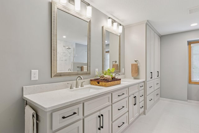 18172 Tamarack Dr, Minnetonka, MN 55345 - full bathroom featuring double vanity and a tile shower