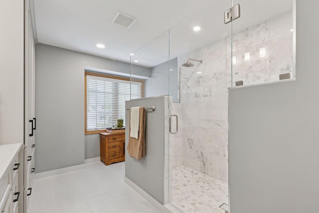 18172 Tamarack Dr, Minnetonka, MN 55345 - bathroom with a shower stall, baseboards, and recessed lighting