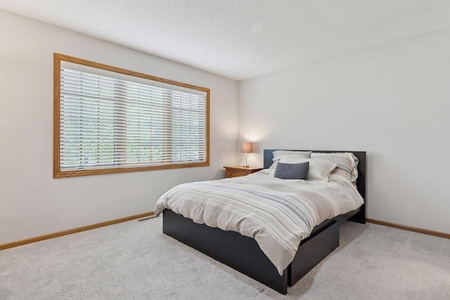 18172 Tamarack Dr, Minnetonka, MN 55345 - carpeted bedroom with baseboards and a textured ceiling
