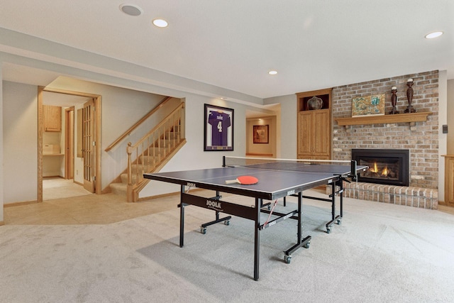 18172 Tamarack Dr, Minnetonka, MN 55345 - game room with light carpet, recessed lighting, a fireplace, baseboards, and light tile patterned flooring
