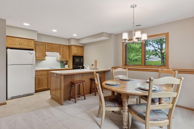 18172 Tamarack Dr, Minnetonka, MN 55345 - dining room featuring a chandelier, light colored carpet, recessed lighting, and light tile patterned floors