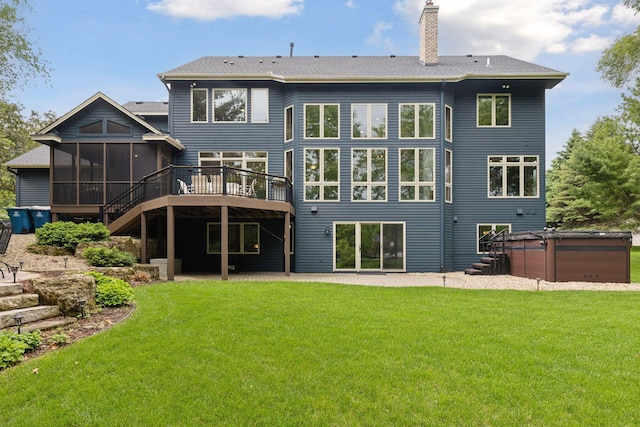 18172 Tamarack Dr, Minnetonka, MN 55345 - rear view of property with a sunroom, a chimney, stairway, a wooden deck, and a lawn