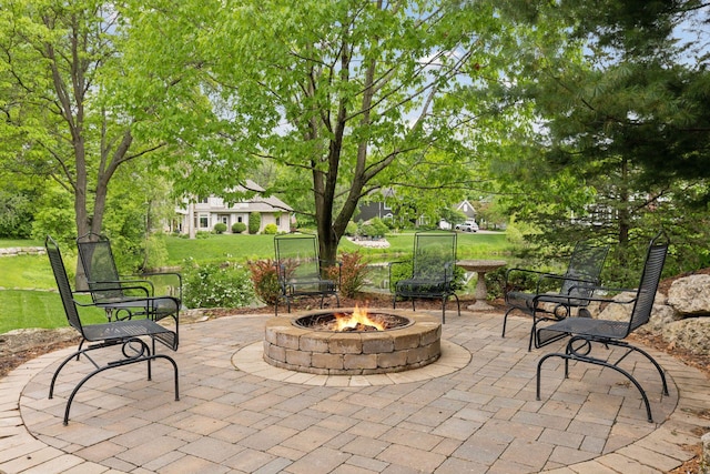 18172 Tamarack Dr, Minnetonka, MN 55345 - view of patio / terrace featuring a fire pit