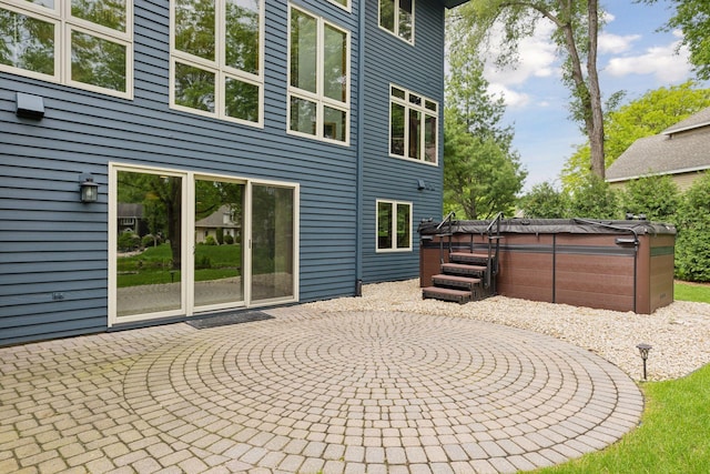 18172 Tamarack Dr, Minnetonka, MN 55345 - view of patio / terrace with a hot tub