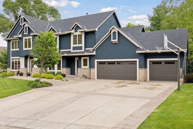 18172 Tamarack Dr, Minnetonka, MN 55345 - craftsman-style house with brick siding, an attached garage, concrete driveway, and a shingled roof