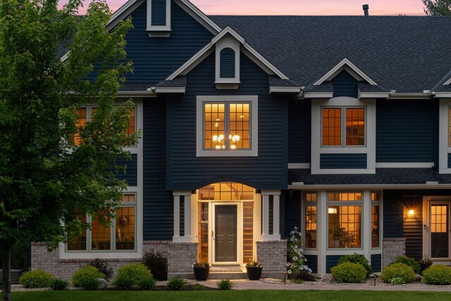 18172 Tamarack Dr, Minnetonka, MN 55345 - view of front facade with a shingled roof
