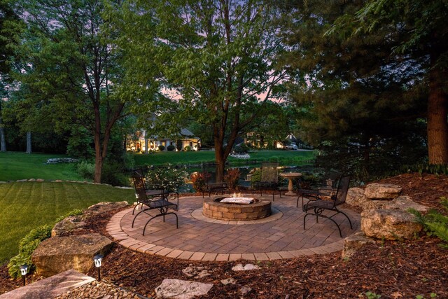 18172 Tamarack Dr, Minnetonka, MN 55345 - view of patio featuring an outdoor fire pit