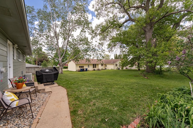 311 Wisconsin St, Lake City, MN 55041 - view of green lawn with central AC unit