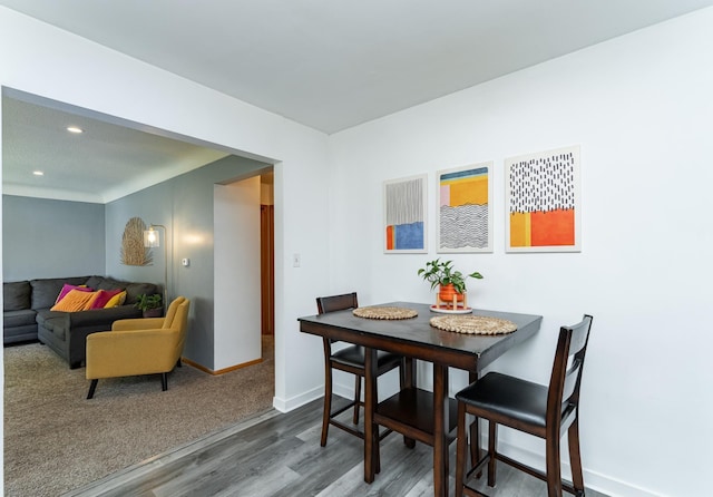 311 Wisconsin St, Lake City, MN 55041 - dining space featuring wood finished floors, baseboards, and recessed lighting