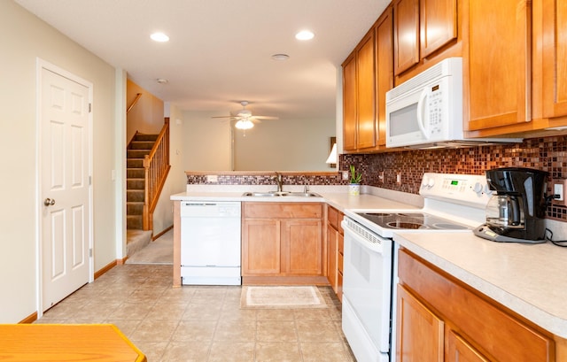 4960 149th St N Unit 6, Hugo, MN 55038 - kitchen with white appliances, a sink, ceiling fan, backsplash, and recessed lighting