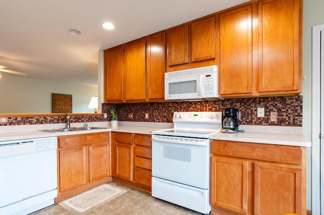 4960 149th St N Unit 6, Hugo, MN 55038 - kitchen featuring white appliances, a sink, backsplash, light countertops, and recessed lighting