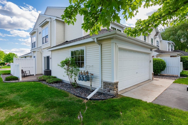 4960 149th St N Unit 6, Hugo, MN 55038 - view of side of property featuring concrete driveway and an attached garage