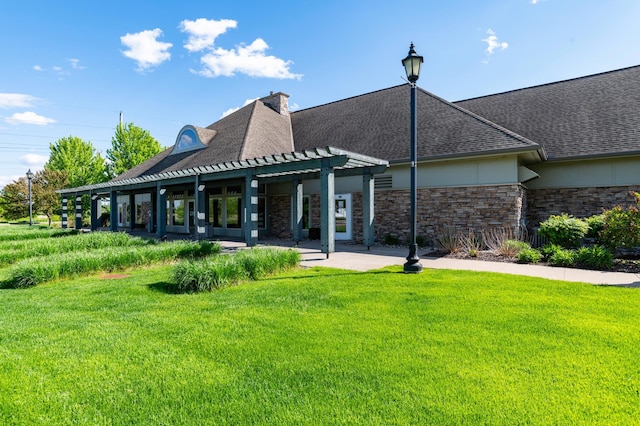 4960 149th St N Unit 6, Hugo, MN 55038 - back of property featuring a pergola, a lawn, and roof with shingles