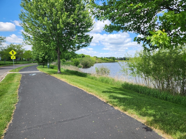 4960 149th St N Unit 6, Hugo, MN 55038 - view of asphalt street featuring traffic signs and a water view