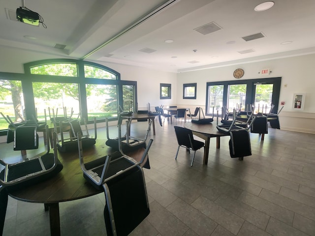 4960 149th St N Unit 6, Hugo, MN 55038 - dining area featuring healthy amount of natural light and crown molding