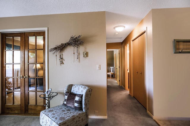 1825 Perlich Ave Unit 206, Red Wing, MN 55066 - hall with french doors, a textured ceiling, and carpet flooring