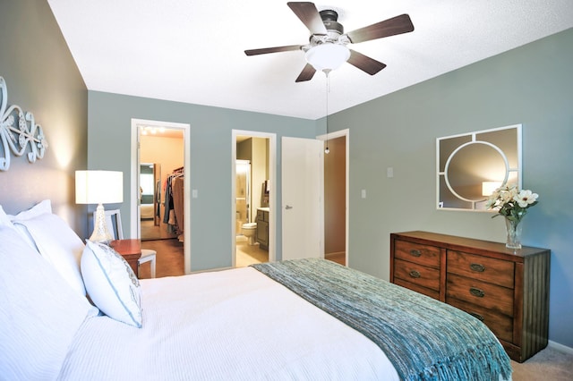 1825 Perlich Ave Unit 206, Red Wing, MN 55066 - bedroom featuring carpet flooring, a spacious closet, a closet, ceiling fan, and ensuite bath