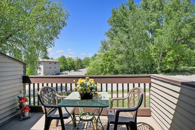 1825 Perlich Ave Unit 206, Red Wing, MN 55066 - wooden deck featuring outdoor dining area