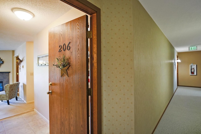 1825 Perlich Ave Unit 206, Red Wing, MN 55066 - hall with light colored carpet, baseboards, and light tile patterned flooring