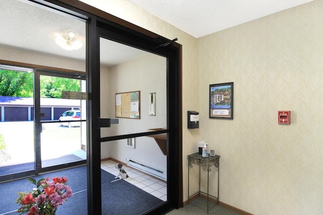 1825 Perlich Ave Unit 206, Red Wing, MN 55066 - home office with baseboard heating, wallpapered walls, a textured ceiling, baseboards, and tile patterned floors