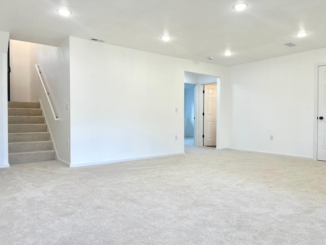 826 Sims Ave, Saint Paul, MN 55106 - empty room with light carpet, recessed lighting, stairway, and baseboards