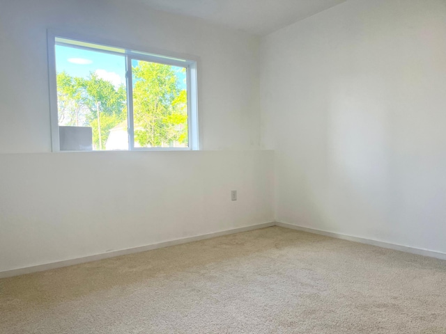 826 Sims Ave, Saint Paul, MN 55106 - unfurnished room with carpet floors and baseboards