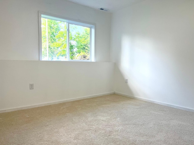 826 Sims Ave, Saint Paul, MN 55106 - empty room with light colored carpet and baseboards