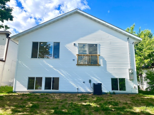 826 Sims Ave, Saint Paul, MN 55106 - back of house featuring central AC unit