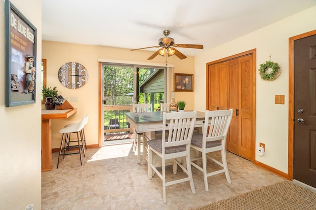 721 Maple Dr, Aurora, MN 55705 - dining area with ceiling fan and baseboards