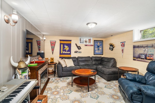721 Maple Dr, Aurora, MN 55705 - living room with concrete block wall