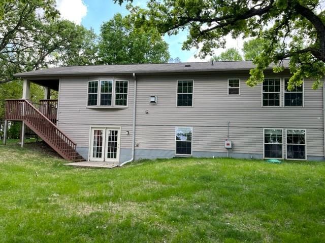 614 S Shore Dr S, Windom, MN 56101 - rear view of house with a yard, stairs, a wooden deck, and french doors