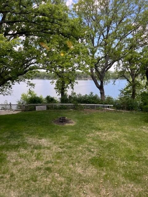 614 S Shore Dr S, Windom, MN 56101 - view of yard featuring a water view and a fire pit
