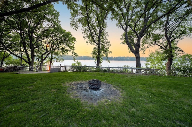 614 S Shore Dr S, Windom, MN 56101 - view of yard featuring a water view and a fire pit