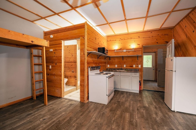 614 S Shore Dr S, Windom, MN 56101 - kitchen with white appliances, wooden walls, a sink, dark wood-style floors, and white cabinetry