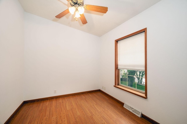 614 S Shore Dr S, Windom, MN 56101 - unfurnished room featuring light wood-style floors, baseboards, and a ceiling fan