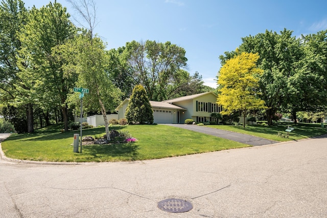 17915 17th Ave N, Plymouth, MN 55447 - split level home featuring driveway and a garage