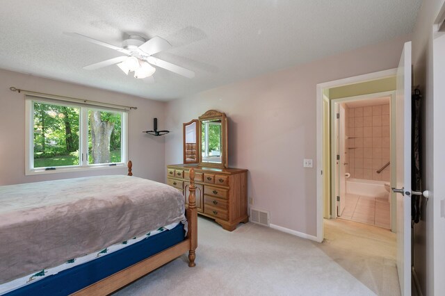 17915 17th Ave N, Plymouth, MN 55447 - bedroom with light colored carpet, a textured ceiling, a ceiling fan, and baseboards